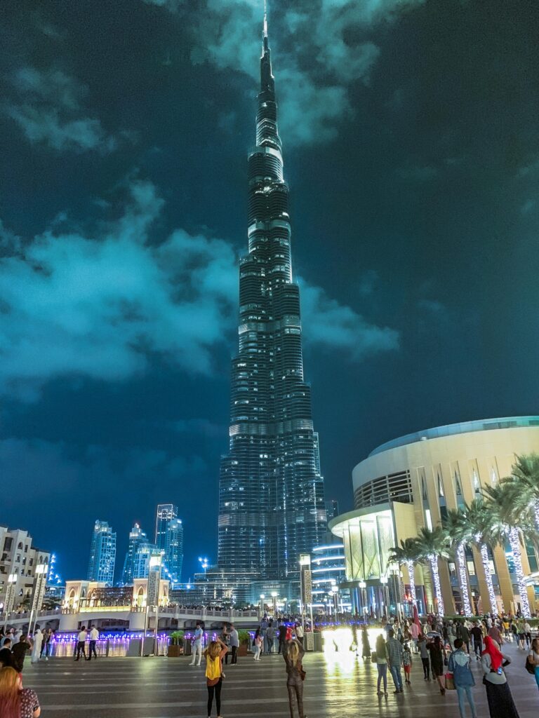 Stunning night view of Burj Khalifa, the tallest skyscraper in Dubai, illuminated against the sky.